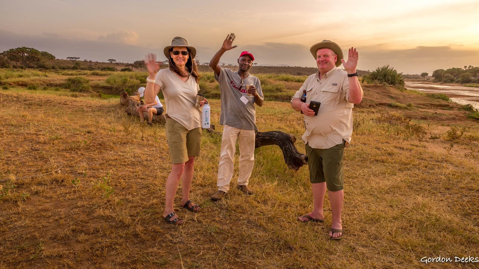 Guests enjoying a sundowner on safari in Kenya